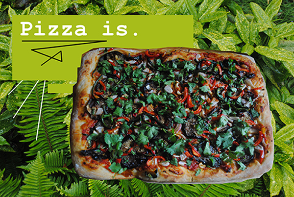 pizza with leafy background
